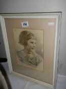 A vintage framed drawing of a young girl, COLLECT ONLY.