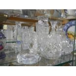 A mixed lot of glass ware including decanters, vases, tankards etc.,