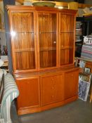 A golden oak wall unit with cut glass doors, COLLECT ONLY.