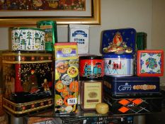 A mixed lot of vintage tins.