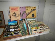 A quantity of hunting and gun related books.