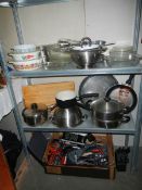 Three shelves of assorted kitchen ware including stainless steel, Pyrex etc., COLLECT ONLY.