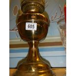 A brass oil lamp. (no shade or chimney)