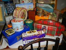 A large quantity of vintage and collectable tins.