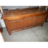 A 1950's oak linenfold blanket box, COLLECT ONLY.