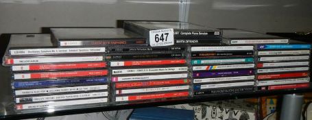 A quantity of classical music CD's.