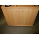 A light wood computer desk/cupboard, COLLECT ONLY.