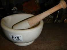 An acid proof pestle and mortar.