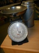 A set of vintage Henson kitchen scales and a hot food container.