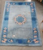 A blue coloured rug (few marks on) - 185cm x 122cm COLLECT ONLY