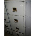 A steel four drawer filing cabinet. COLLECT ONLY