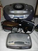 A Hitachi 'Boombox' radio, cassette, CD player and others.