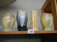 A pair of mid 20th century vases and two others.