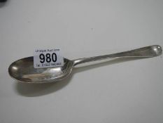 A hall marked silver table spoon.