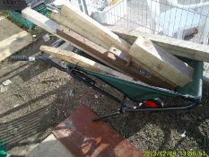 A foldable wheel barrow and a quantity of timber. COLLECT ONLY.