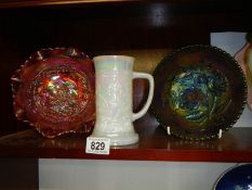 Two carnival glass dishes and a white glass tankard.