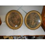 A pair of framed and glazed late Victorian oval engravings.