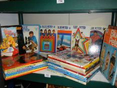 A shelf of Blue Peter annuals.