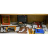 A shelf of assorted tools.