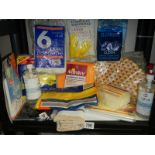 A shelf of assorted cleaning cloths etc.,