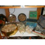 A shelf of old wooden jigsaw puzzles, completeness unknown