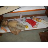 An old doll a/f and three other toys,.