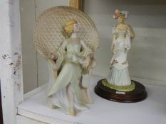 A 1920's style figure and one other.