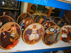 A shelf of collector's plates.