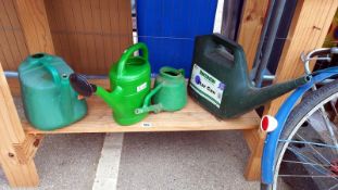 Six plastic watering cans, COLLECT ONLY.