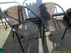 A pair of rattan garden chairs. COLLECT ONLY.