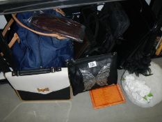 A good mixed lot of hand bags etc.,