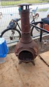 A cast iron garden chimenea. COLLECT ONLY.