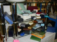 Two shelves of jewellery boxes.