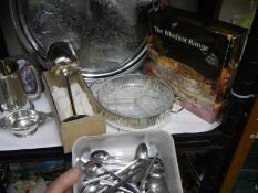 A mixed lot of metal ware including tray, cutlery etc.,