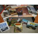 Two shelves of steam railway books.