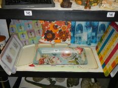 A shelf of assorted plastic trays etc., COLLECT ONLY.