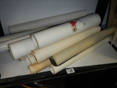 A quantity of rolled posters.
