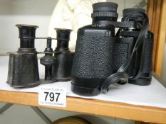 Two pairs of binoculars.