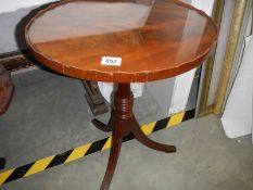 A clean mid 20th century mahogany tripod table.