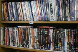 Two shelves of assorted DVD's.