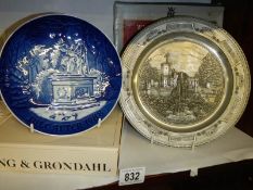 A Copenhagen Hans Christian Anderson plate and a WMF Jahresteller 1990 plate.