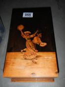 A good quality box inlaid with dancers.