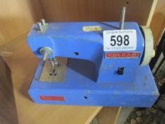 A Vulcan miniature sewing machine