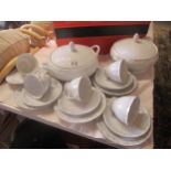 A part tea service and two tureens