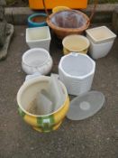 A mixed lot of garden planters and pots