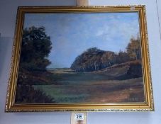 A gilt framed oil on board signed HGB 73 of open land between trees.