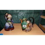 A Chinese figural pottery teapot & a figure