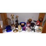 A shelf of Candle Holders and Candles including Yankee