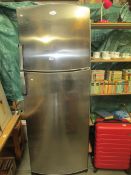 A Whirlpool stainless steel fridge freezer