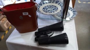 A leather cased pair of King 30 x 70 binoculars.